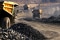 Heavy machinery transporting materials at an aggregates site