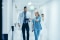Medical staff discussing patient details in a clinical setting