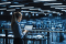 Engineer monitoring data centre systems in a temperature-controlled environment